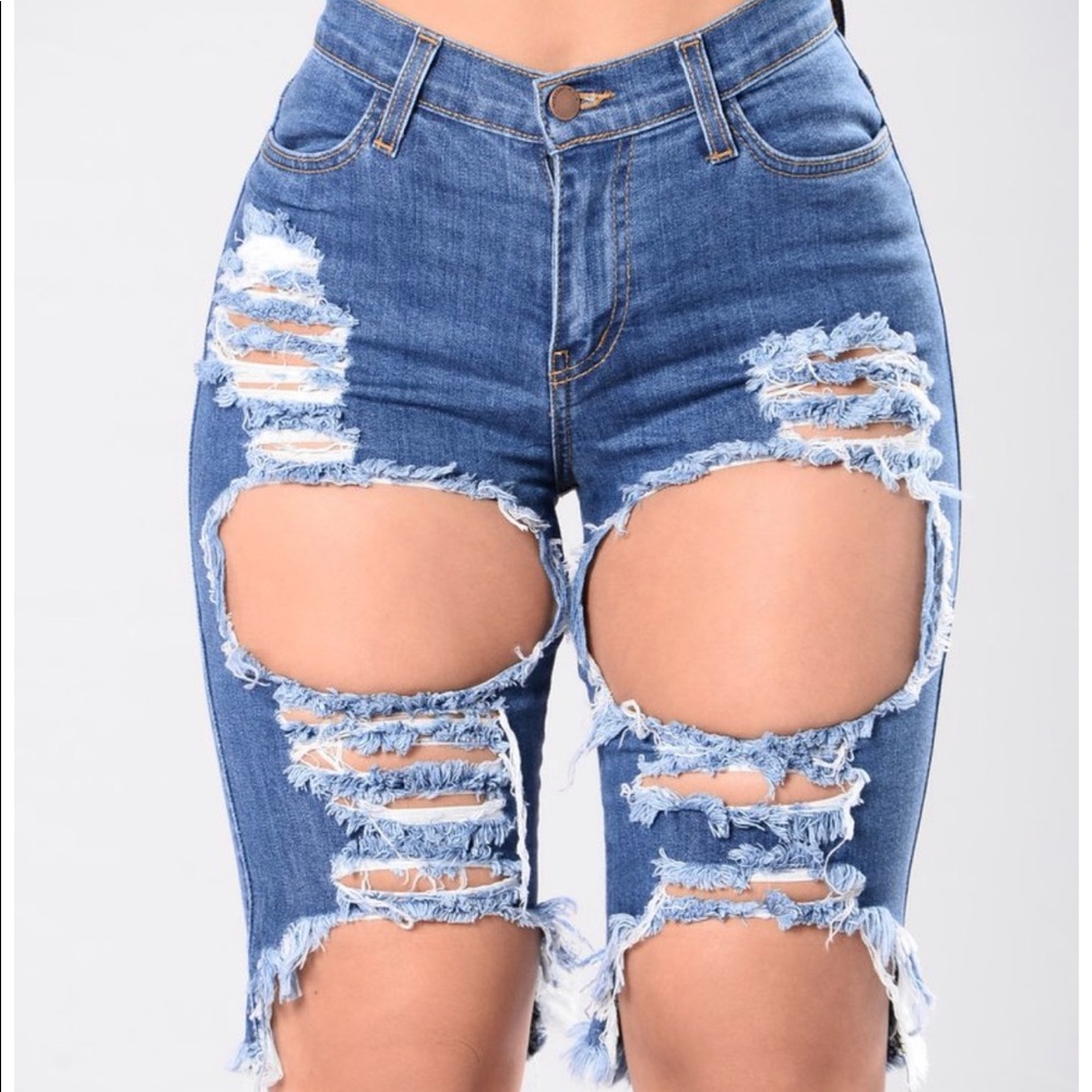 Bermuda ripped jean shorts.